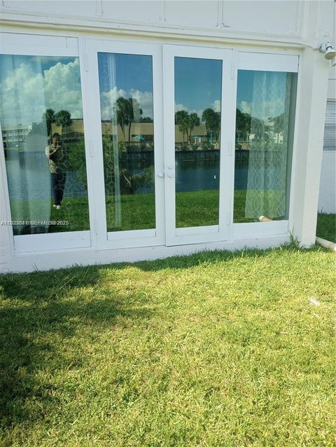 Photo of 8130 Sunrise Lakes Blvd #107, Sunrise, FL 33322 (MLS # A11923541)