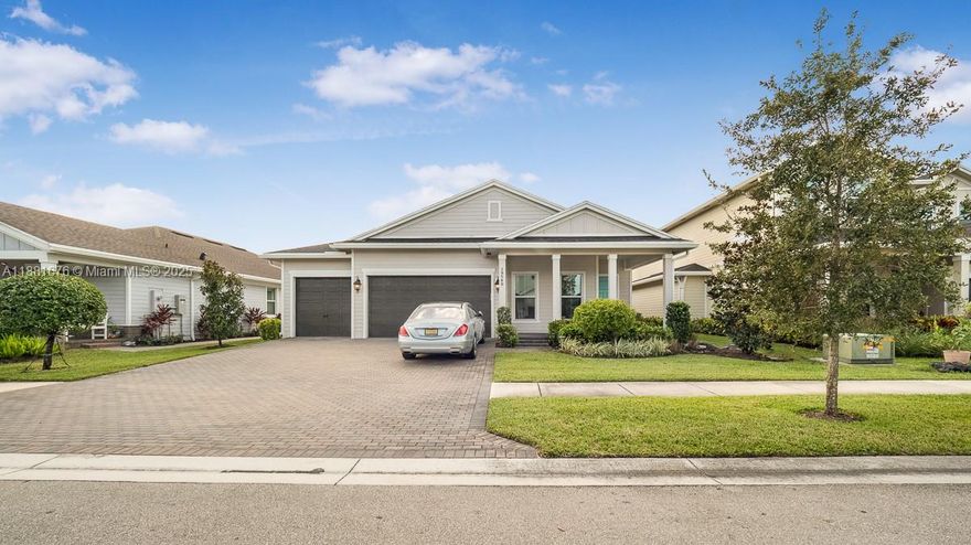 Rare opportunity to own in the award-winning community of Arden! This popular Antigua model offers 10’6” ceilings, 3 bedrooms, 3 bathrooms, and a spacious 3-car garage. The home is filled with upgrades including impact windows throughout, porcelain plank tile floors, upgraded two-tone kitchen cabinetry with a large island, quartz countertops, and cedar shelving in all closets and pantry. The master bath features elegant 24” tile flooring with matching wall tile, while the backyard is fully enclosed with an aluminum fence, perfect for outdoor enjoyment. Zoned for A-rated Wellington schools, this home combines modern style, quality finishes, and a prime location. Come see it today—you won’t be disappointed!