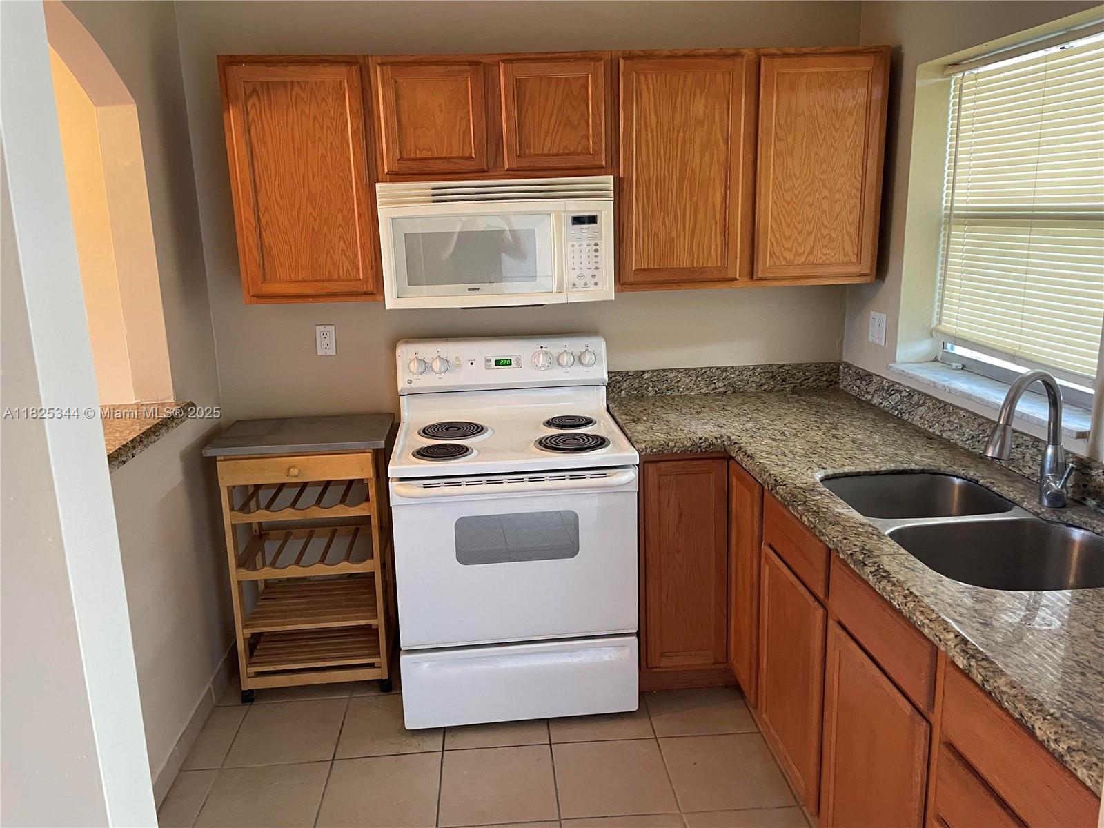 55+ community Sunrise Lakes Phase 2. Top floor unit with elevator and overlooking the canal. Recently updated kitchen and bathroom. Easy step-in tub and shower. Seller financing available.