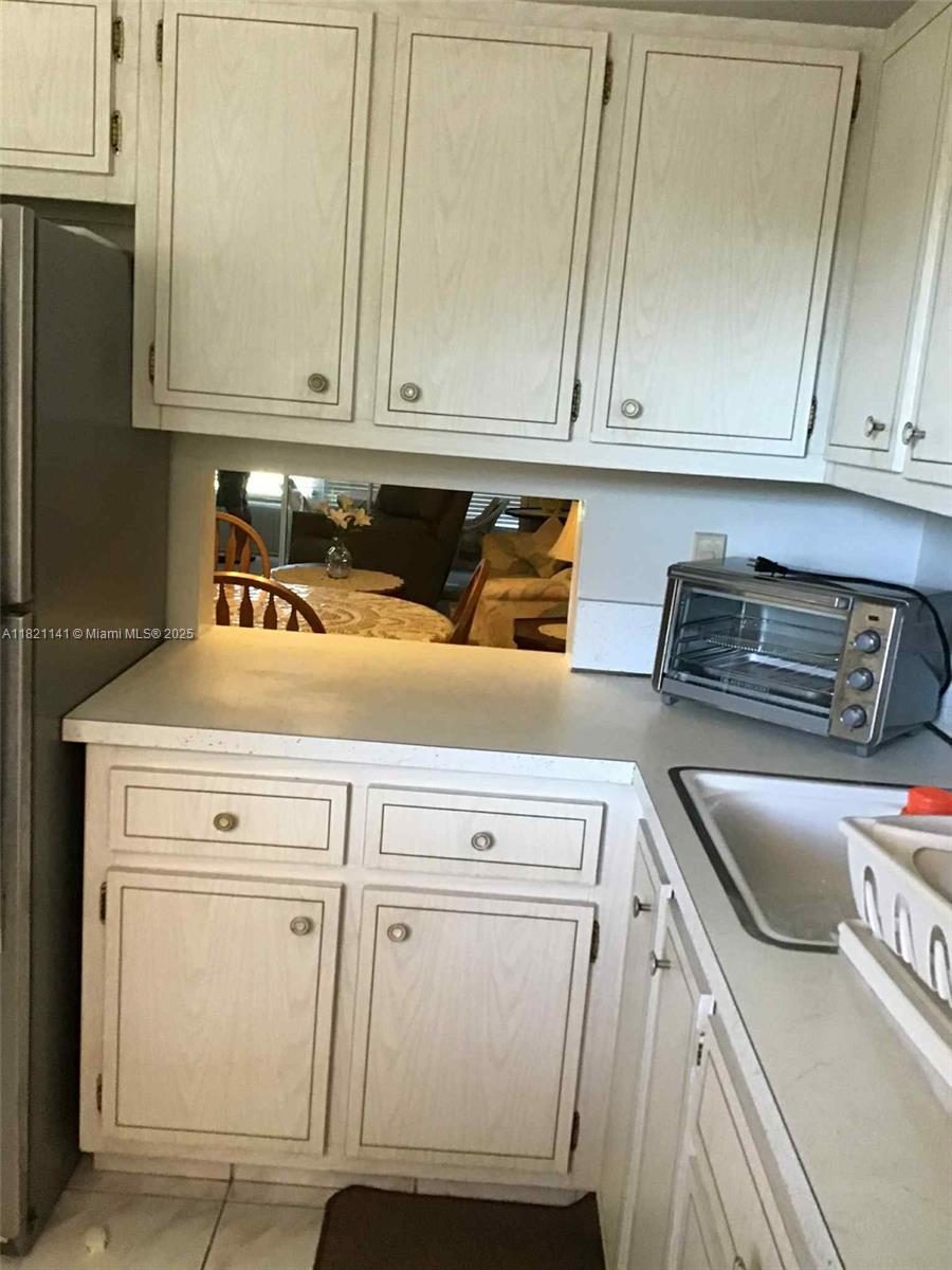 LAUDERDALE OAKS CONDO XII - Residential