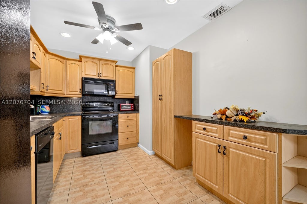 Photo of 1055 NW 83rd Ave #C47, Plantation, FL 33322 (MLS # A12070704)
