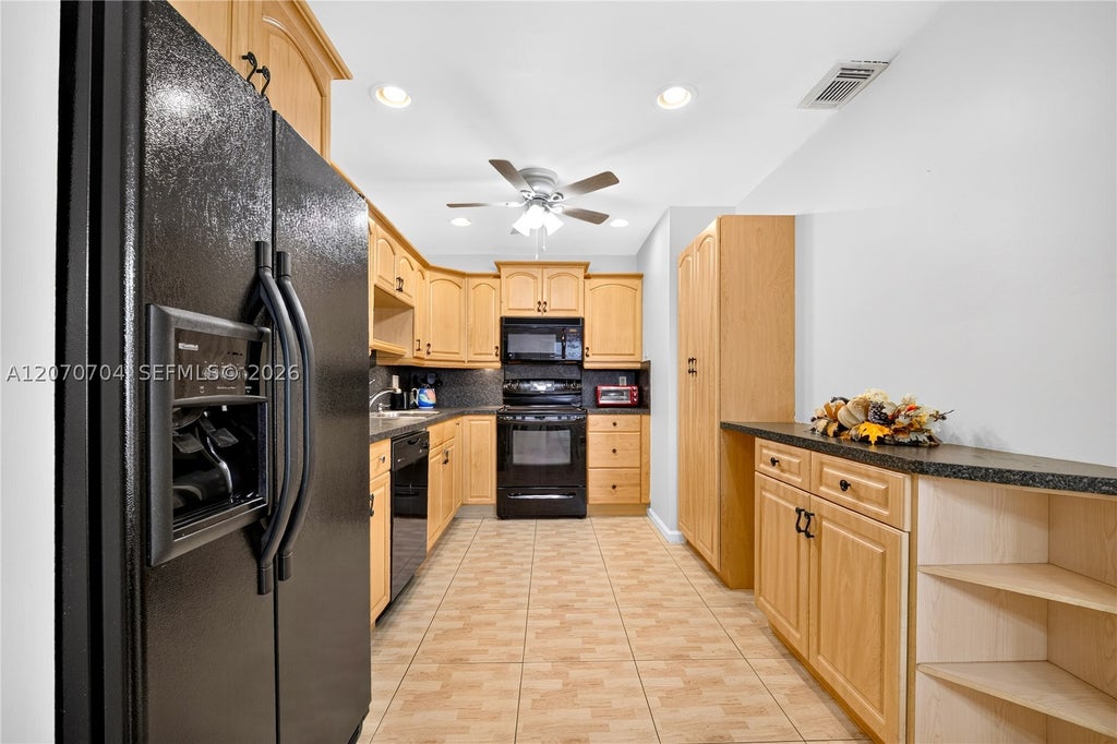 Photo of 1055 NW 83rd Ave #C47, Plantation, FL 33322 (MLS # A12070704)