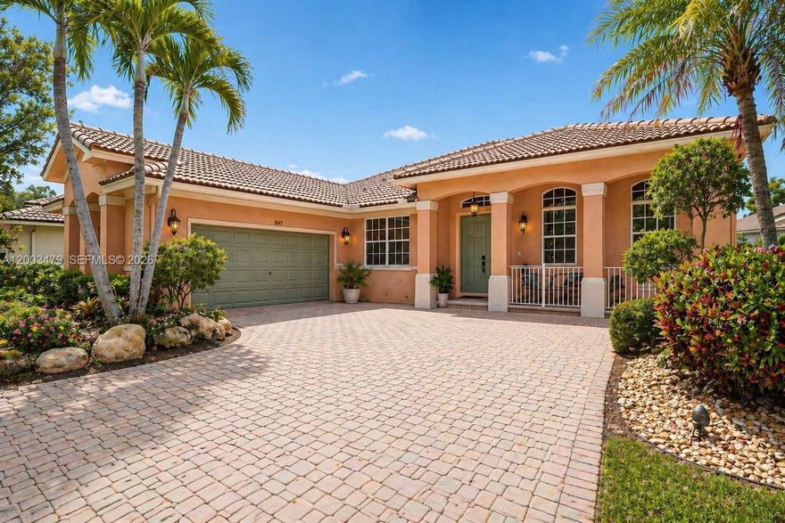 Versatile Dove model in one the the most exclusive Subdivisions in the guard gated Savanna, one of Weston’s most sought after resort style communities. This one story 4 bedroom, 2.5 bath home offers an open concept layout is perfect for entertaining with high ceilings, crown molding, and abundant natural light. Lushly landscaped, quaint front porch, excellent curb appeal, and side entry two car garage create an inviting first impression. The spacious updated kitchen features granite countertops, a large center island with seating, separate breakfast area, built in bar, desk space, and generous cabinetry. The oversized covered and screened patio extends the living space outdoors, ideal for entertaining and everyday relaxation. Room for a pool.  The primary suite features volume ceilings and organized closet space. Tile flooring runs throughout the main living areas, with laminate wood flooring in the bedrooms. Two remodeled showers add a fresh modern touch. A separate laundry room leads to the garage, offering additional storage. Extended papered driveway, situated right next to a huge park to enjoy your favorite sports!  Enjoy access to A+ schools and Savanna’s exceptional amenities, including resort style pools, fitness center, water slide, playgrounds, and more