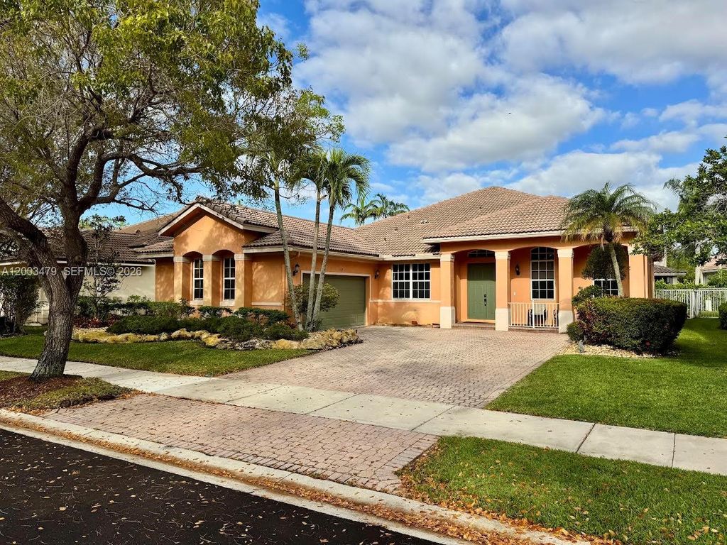 Photo of 1169 Peregrine Way, Weston, FL 33327 (MLS # A12003479)