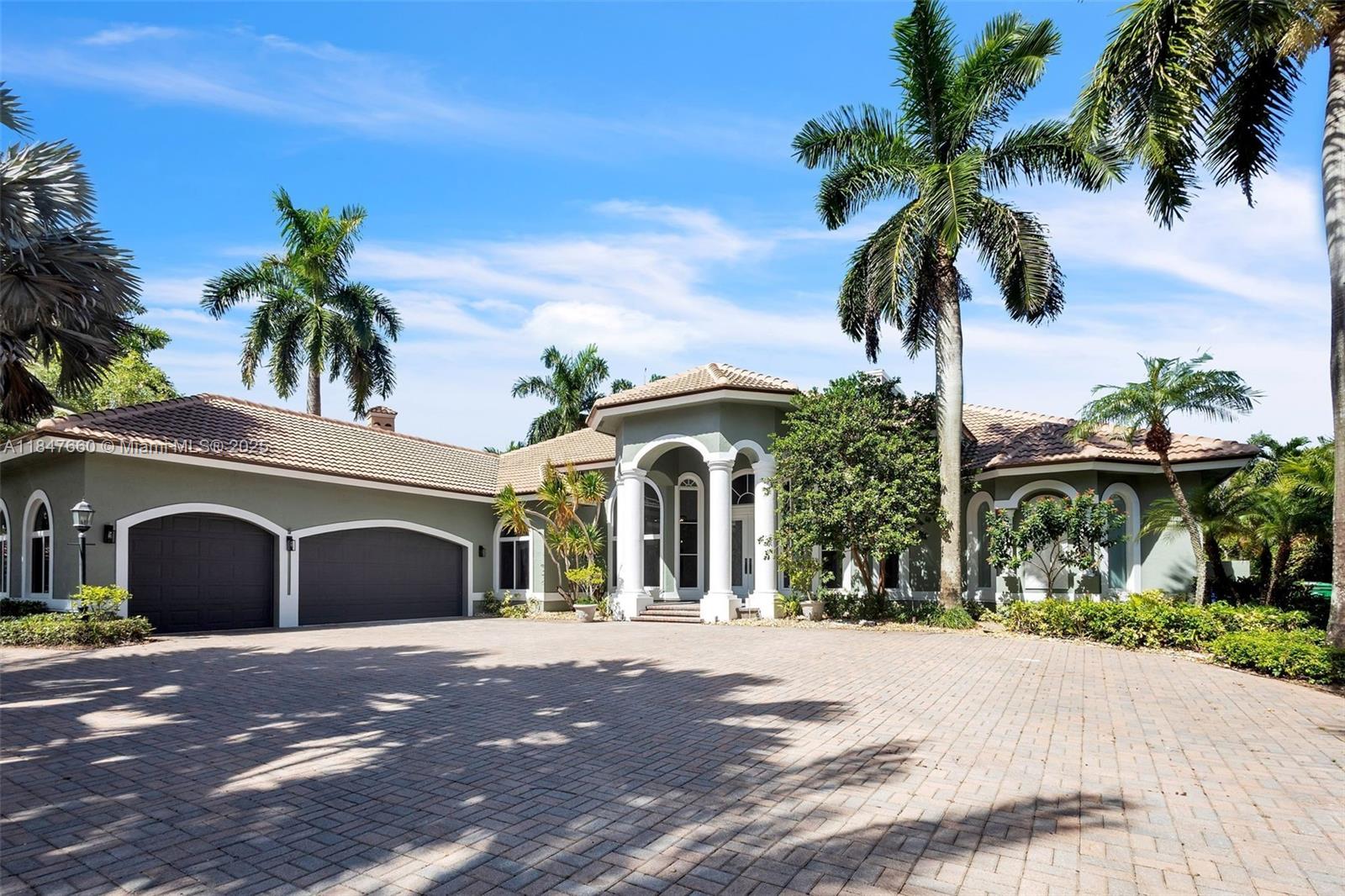 Complete modern remodeling. New Roof with 3 solar fans, Full Impact windows and Doors, Two new ACs, Mosaic Pool remodeling with 15 years warranty on labor and material. Luxury at its best in The Falls at Heron Bay, one of the most prestigious and exclusive double-gated communities in Parkland. This enclave of fully custom homes offers unmatched privacy, luxury, and security. Two wood burning fireplaces, Extra large circular driveway, direct views of The Falls, this property combines serenity, security, and sophistication in every detail. Located just minutes from top-rated A+ schools, upscale dining, and convenient highway access. Heron Bay is a highly esteemed community with top-notch amenities.