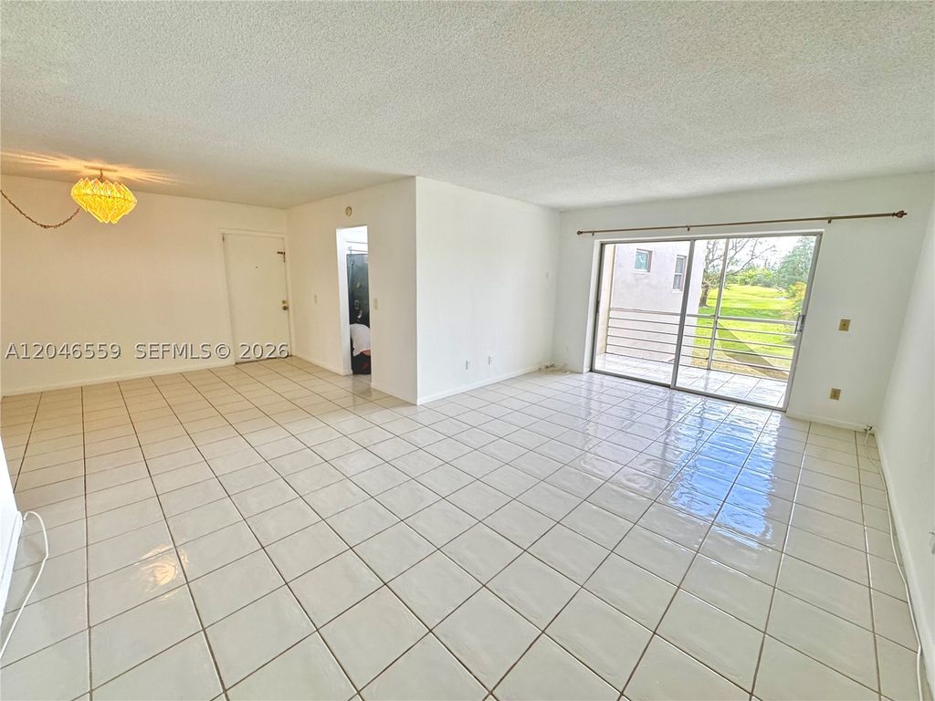 Photo of 2495 SW 82nd Ave #205, Davie, FL 33324 (MLS # A12046559)