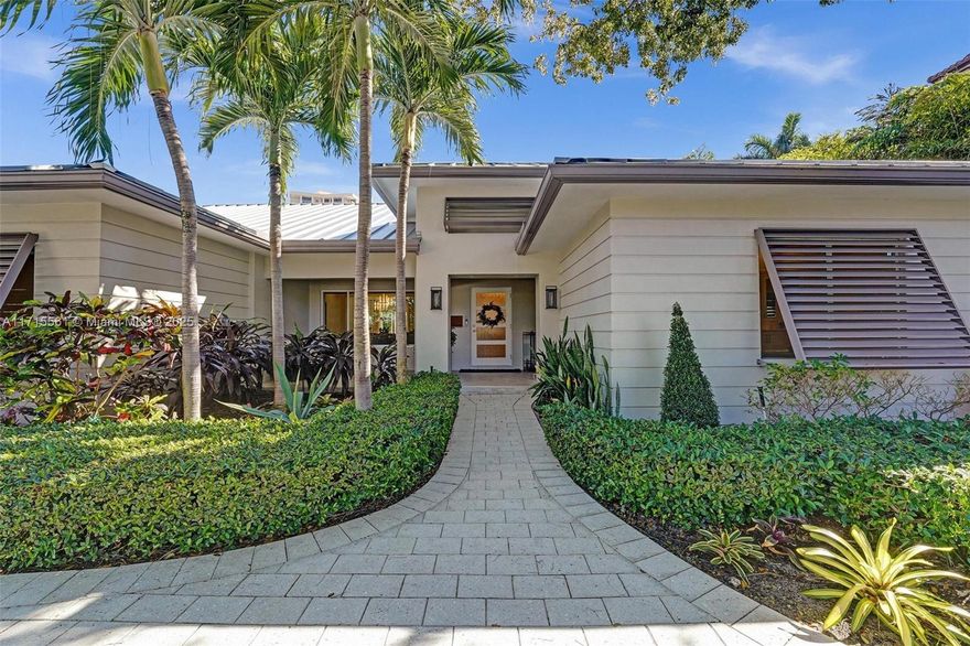 Single Story Key West style beach home in most desirable street in Harbor Beach. This home has been freshly painted, new LED Lighting inside/ out, new hard wood floors in all bedrooms. Walk to Beach Club and Marina. Guard gated and patrolled. Split floor plan. 4/4 with office and bonus area for gym or play area. Wrap around covered patio w/built-in grill and fridge. Salt Water Pool and Spa w/child fence.