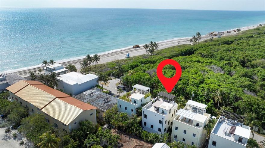 Indulge in coastal opulence at our exquisite 3-story beachfront beauty! Nestled along the sun-kissed shores, this luxurious retreat offers unparalleled views & is just steps away from the sand + water! Enjoy S Fl living on the amazing roof deck w/ stunning views plus a summer kitchen with built in grill! This home faces south towards a private nature preserve! Upon entry, is a foyer plus full bedroom, bathroom and access to your private pool! The main living level on second floor features a true chef's kitchen w/ natural gas + high end appliances. Very functional 4/4 floor plan with an elevator. Primary bedroom has a large seating area + balcony. Impact windows & door. 2 car garage. Head to Hollywood Beach and boardwalk w/ your own private walk way! An incredibly unique property! NO HOA!