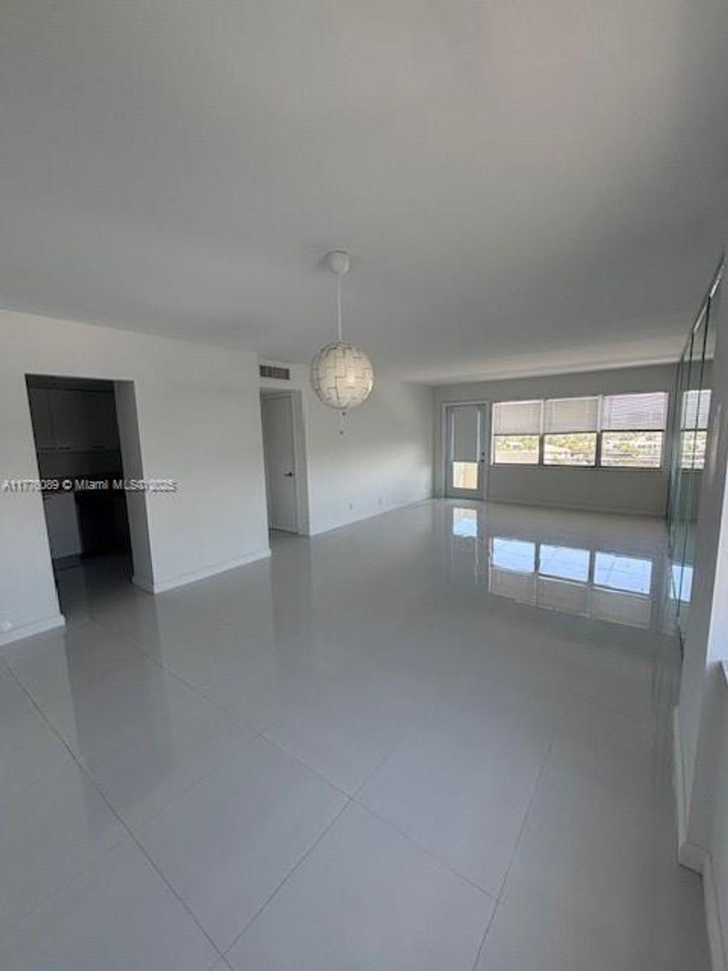 Photo of 401 Golden Isles Dr #712, Hallandale Beach, FL 33009 (MLS # A11776089)