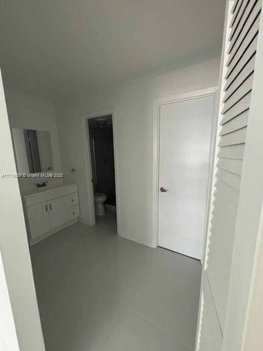 Photo of 401 Golden Isles Dr #712, Hallandale Beach, FL 33009 (MLS # A11776089)