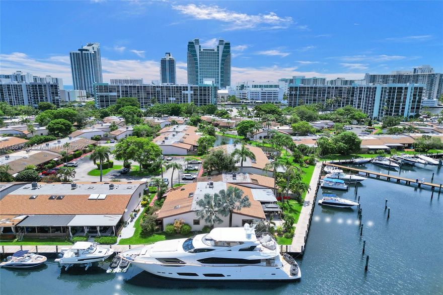 ATTENTION BOATERS!!! This corner waterfront villa is the jewel of the community in Harbourwood Villas. No other residence offers this much dock space, 136 feet, to be exact. Your private L-shaped dock has 94 feet on one side and 42 feet on the other side. Enough space to accommodate multiple boats, and boat lift is included. Outside, the property boasts a private waterfront patio, built-in jacuzzi, and gazebo. The fully furnished open layout creates a seamless flow between the living, dining, and kitchen areas, making it ideal for entertaining friends or simply unwinding after a day on the water.