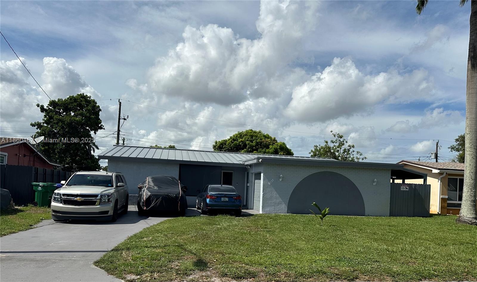 Updated 4BR/3BA home with pool, impact windows & doors, and metal roof. Features modern open layout, stylish kitchen, and spacious primary suite. Includes private in-law quarters with income-producing potential. Backyard oasis with pool and covered patio. Move-in ready and built to last!