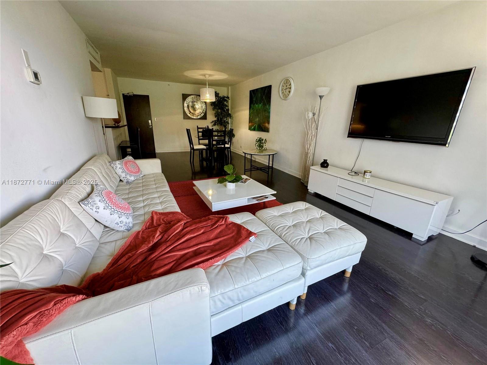 Experience resort-style living at The Flamingo South Beach. This stunning 2-bed, 2-bath condo offers breathtaking bay views and gorgeous sunsets from the balcony, perfect for working from home. Currently rented by great tenants until August 31st for $4,000. Located in prime South Beach, the building boasts a variety of amenities:24-hour security, a state-of-the-art gym, multiple pools/spas, a restaurant, a dog park, and more. Residents also enjoy a rare parking spot and the option for monthly rentals up to 12 times a year. Enjoy the lush gardens, bayfront pools, sandy beach, Jacuzzi, fitness center, spa, and bay walk within the expansive 17-acre complex.
Within walking distance to Lincoln Road shops, restaurants, and the beach, this is the perfect condo to live in, rent out, or do both!