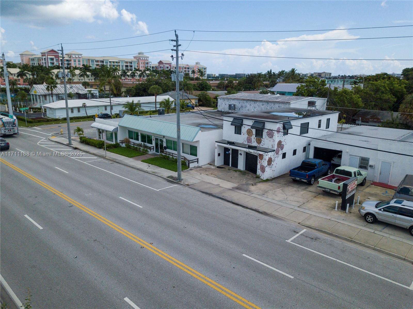 This unique property offers exceptional value and is priced to sell. The top level consists of a fully remodeled apartment which could also be used as an Office. Level one consists of two separate garage spaces, in which 4-5 vehicles could be parked inside. Additionally, the rear end of the property has some outdoor area covered to park another two vehicles, and the front of the building also has more parking area to use. The property is vacant and presents an excellent opportunity for an owner-user to occupy one section (even potentially using level 1 as a residence) while generating rental income from the other, or to utilize the entire building to meet their needs.