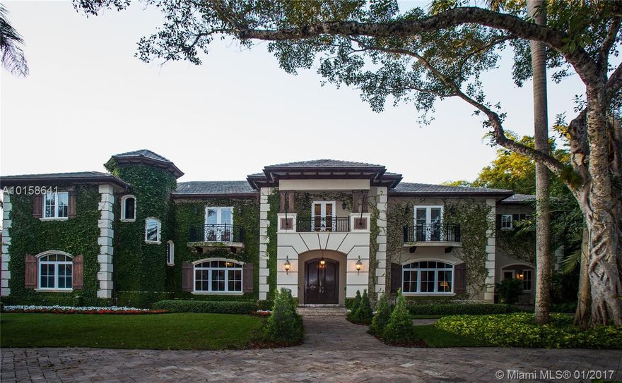 Re-Priced & Motivated:Miami Splendor:Private Estate enclave Ponce-Davis area;Contemporary Tudor Design integrating indoor elegance w/outdoor living. INSIDE: Features large rooms,volume ceilings, Lg.kitchen gas range,Office,wine room,billiard room, elevator, maid's room OUTSIDE:Impact Windows &Doors; covered poolside outdoor gathering area;outdoor kitchen with bar; pool with spa and walk-in beach platform  swim-up seating; putting green;Whole House Generator;Children Play ground; Mosquito Misting System;