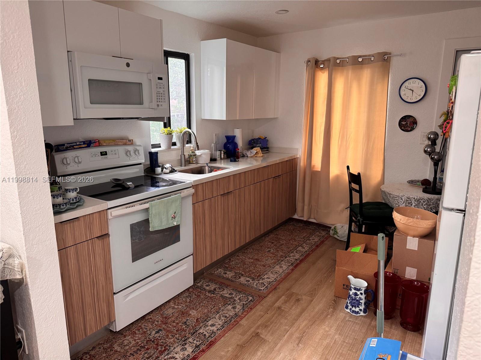 TROPICS MANOR - Residential Lease