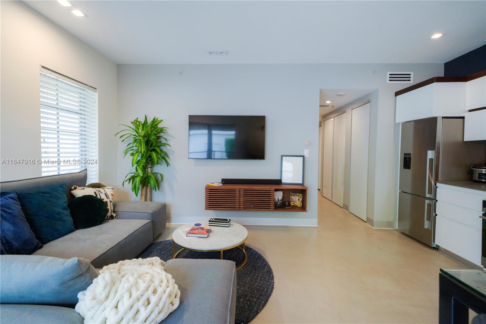Pamper yourself in this stunning 1 Bedroom apartment with 650 SF at the historic Art Deco Governor building in the heart of South Beach. A large living room with dining area, open kitchen, wood cabinets & granite countertops followed by a hallway with closets bringing to the bedroom and bathroom with a rain shower. Just steps from the convention center and 5 minutes' walk to the beach where service with lounge chairs and umbrella is setup on the sand. Arte city is a private community with 24hour security nested in the middle of a tropical garden surrounded by fountains. 2 pools, a gym, and a social room. Assigned covered parking. EV charging station. Miele washer and dryer. 30 days minimum rental policy. This pied-a-terre offers the perfect combination to fully live in the Miami lifestyle.