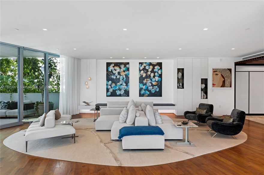 Entertain in the ultimate Miami Beach residence at Monad PHE, with stunning views of the Atlantic Ocean, Biscayne Bay, and the Miami skyline. Featured in Florida Design magazine, this 11,100 sq ft penthouse designed by Deborah Wecselman seamlessly blends indoor and outdoor living. The interiors are adorned with rich Italian wood, marble floors, and custom millwork. The elegant great room features a sleek black marble and gold brass wet bar with ice maker and a showpiece wine fridge that holds up to 400 bottles. Your private 7000 sq ft private rooftop houses a pool, spa, outdoor kitchen, and living green wall—ideal for relaxation or hosting. Monad Terrace, by Pritzker Prize-winner Jean Nouvel, includes a 116-foot pool, 24-hour security, porte cochère with valet, and a fitness center.