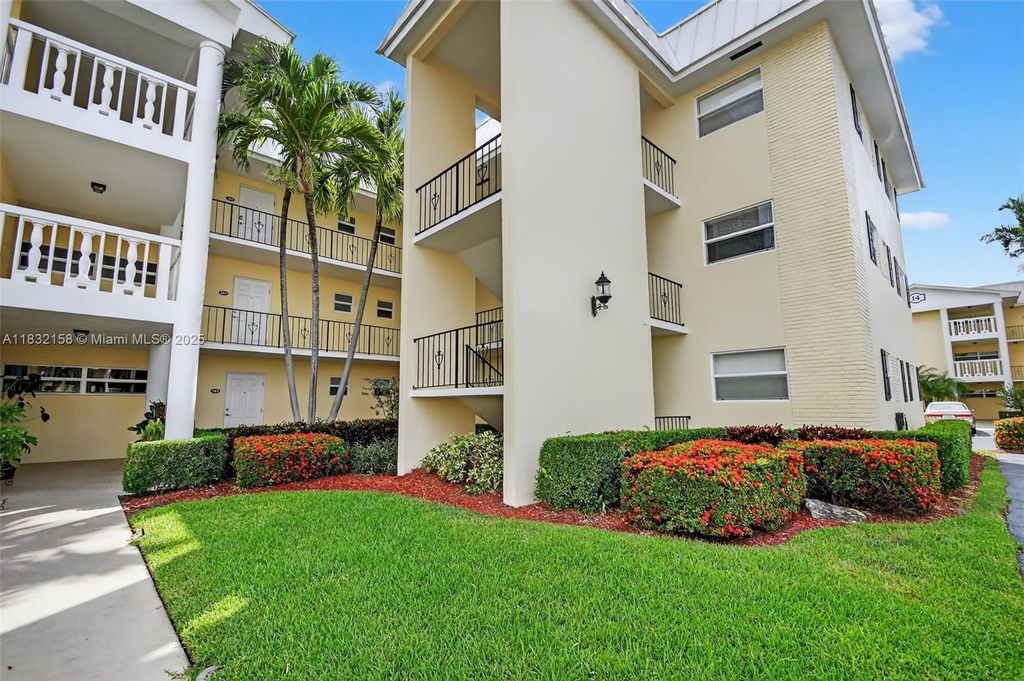 Photo of 16 Colonial Club Dr #205, Boynton Beach, FL 33435 (MLS # A11832158)