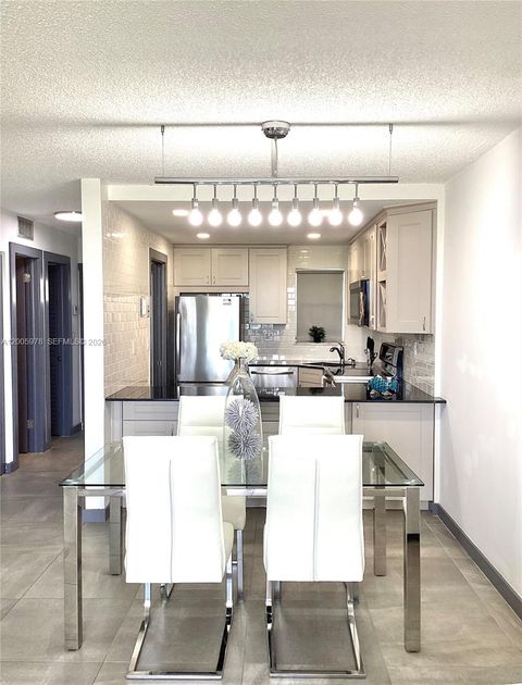 Tiny photo for 8900 Washington Blvd #PH2A, Pembroke Pines, FL 33025 (MLS # A12005978)