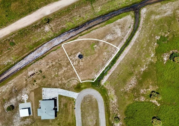 Photo 1 of 39 — 218 LYNBROOK LOOP, La Belle, FL 33935
