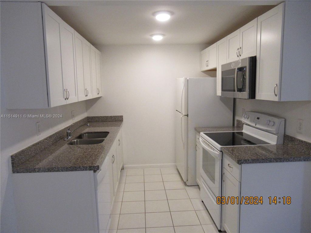 Photo of 2405 Antigua Cir #J1, Coconut Creek, FL 33066 (MLS # A11514911)