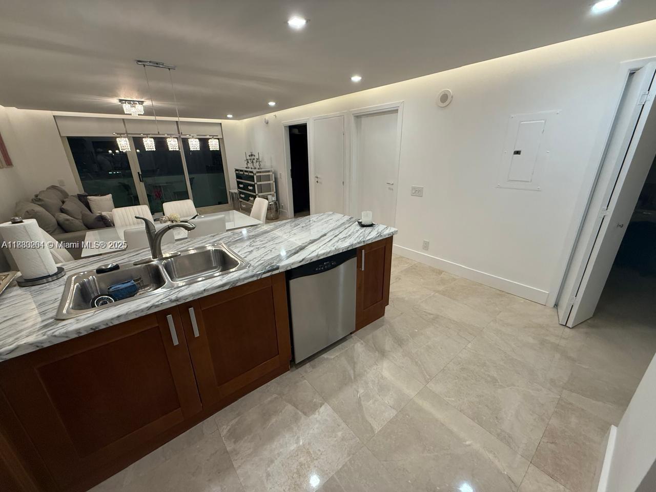9499 Collins Ave 411