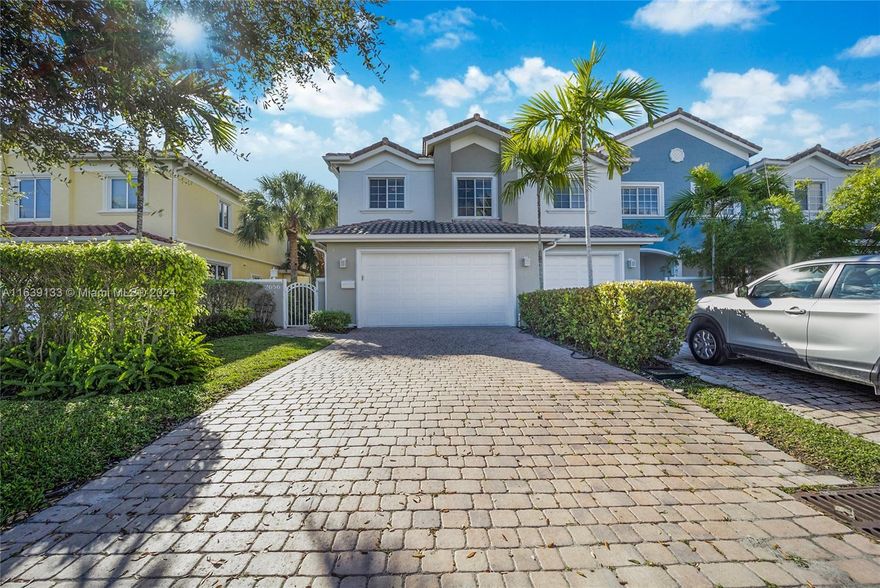 Charming remodeled townhouse offers convenience & comfort for families or those looking to enjoy coastal living. Three  spacious bedrooms & 2.5 modern baths, providing ample space for everyone. Open floor plan connects the LR, dining, and kitchen areas, creating a welcoming atmosphere for entertaining or relaxing. 2-car garage w/ plenty of storage.  Wood floors throughout.  Within walking distance offering easy access to the sand and surf. Pool for cooling off or hosting poolside gatherings. Access to  major highways. Close proximity to excellent schools. Shopping areas & malls are just a short drive away, offering a wide range of retail & groceries.  Prime location & well-appointed features, this townhouse provides a perfect balance of coastal charm and modern convenience.