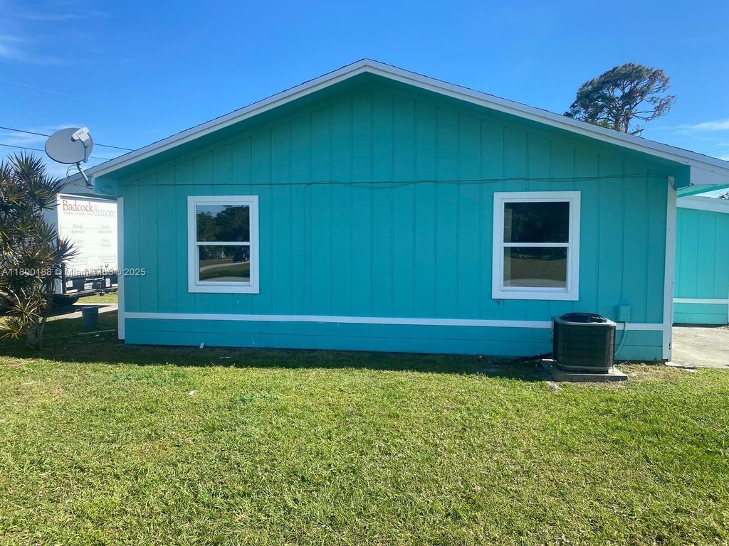 Photo of 6503 Palomar Pkwy #A, Fort Pierce, FL 34951 (MLS # A11800188)