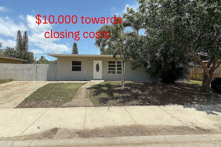 SELLER OFFERING $10K TOWARDS BUYERS CLOSING COSTS. Rent-to-own option available with approved lender. This 3-bedroom, 2-bath single-family home in Hollywood comes with no HOA. Highlights include remodeled bathrooms, CPVC plumbing, and a spacious backyard with room for a boat, RV, or even a pool. The split layout features a large family room that can be converted into a 4th bedroom or an in-law suite with its own entrance—great for a growing family. Tile flooring runs throughout, with laminate in the bedrooms and Florida room. Other upgrades include a new electrical panel and wiring, new AC compressor, updated windows, a laundry room, and a dining area. Tax records don’t reflect the total living square footage. Seller is open to offers. FHA contracts welcome.