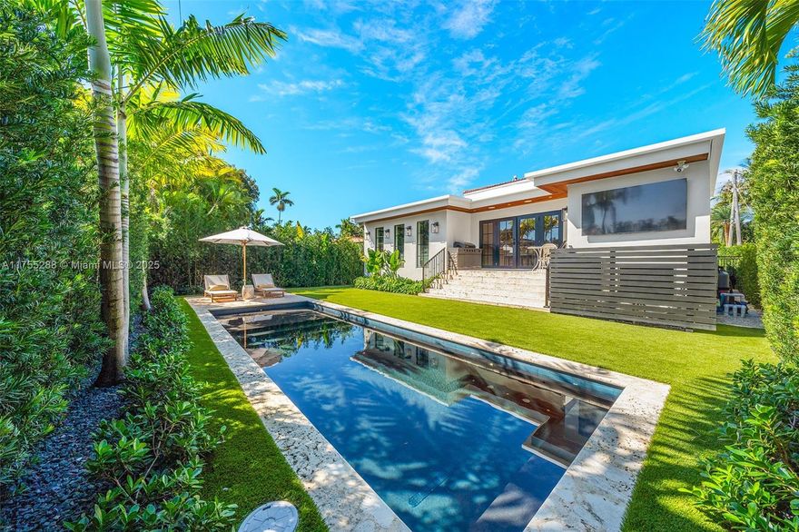 This spacious, fully remodeled two-story home blends modern elegance with high-end finishes. Filled with natural light, it features 3 bedrooms, 3 updated bathrooms, hardwood floors, porcelain tile in the hallway, terrazzo tile in the nursery bathroom, and Florida shellstone in the master bathroom. Redone in 2023 with new electrical, HVAC, plumbing, pool, and flat roof. Luxury touches include Italian doors, Ralph Lauren curtains, Sonos sound, and a marble kitchen island. The quartzite kitchen flows into the dining area, overlooking a fruit tree garden. French doors open to a deck & backyard with a pool and barbecue. Features security cameras, impact windows, landscape lighting, artificial turf & sprinkler system. Near the beach, Bal Harbour & A-rated Bay Harbor Schools.