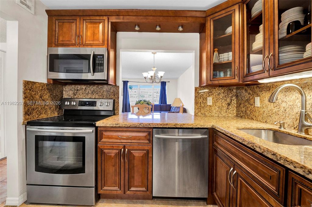 Photo of 410 SE 2nd St #220, Hallandale Beach, FL 33009 (MLS # A11982207)