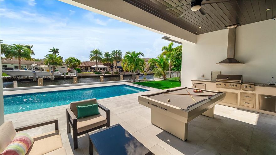 Welcome to this newly built 2023 waterfront estate located in the exclusive Landings community of Fort Lauderdale. This luxurious residence offers 3,130 square feet of impeccably designed living space, featuring 4 bedrooms, 4.5 bathrooms, and 85 feet of Deepwater frontage with direct ocean access—perfect for the boating lifestyle. Built for both comfort and sophistication, this home features:
• A solar panel system and Generac generator powered by a 500-gallon buried gas tank
• Custom outdoor gas kitchen for seamless entertaining
• Wolf appliances, a striking quartz waterfall island, and matching quartz backsplash
• A 15x30 heated and cooled saltwater pool surrounded by lush tropical landscaping
• Concrete seawall, new pilings, and a fully equipped dock with electric and water hookups