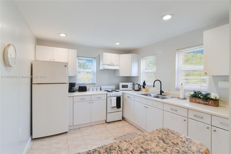 Fantastic location! Well-maintained income-producing duplex, already licensed and operating as an Airbnb. Fully furnished and truly turn-key, it’s ready to start generating returns from day one—no extra work, no extra cost. Sitting on a spacious lot with zoning that allows up to 10 units and 5 stories, this property offers incredible possibilities for expansion or redevelopment.  Perfect investment for immediate passive income. Close to beaches, Downtown Hollywood, Arts Park and so much more.
