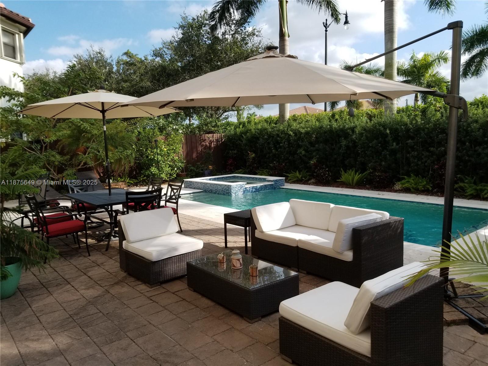 Single-family home in a gated community featuring a private saltwater heated pool with jacuzzi. The property offers 5 bedrooms and 3 full bathrooms, including 1 bedroom and a full bath conveniently located on the first floor. Enjoy a spacious fenced patio with plenty of room for BBQ and outdoor entertaining. The garage accommodates 4 vehicles (2 covered, 2 driveway). SELLER OFFERING $10,000 FOR CLOSING COST.