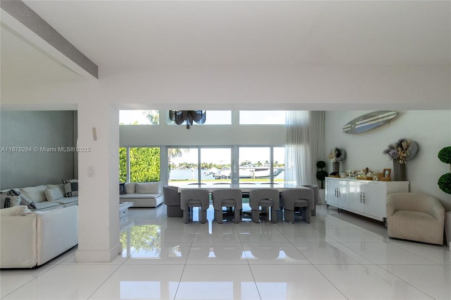 Welcome to Biscayne Point, one of Miami Beach’s most exclusive gated communities! This rare waterfront property offers 75 ft of open bay frontage with stunning views and direct ocean access—perfect for boating and sunsets. Move-in ready with an oversized, grandfathered pool and spacious outdoor living area, it’s ideal for entertaining or relaxing in privacy. Endless potential: add a second story or build a new luxury estate on this exceptional lot. Just minutes from Bal Harbour, world-class dining, and pristine beaches, this home combines lifestyle, location, and investment in one of Miami Beach’s most desirable neighborhoods.