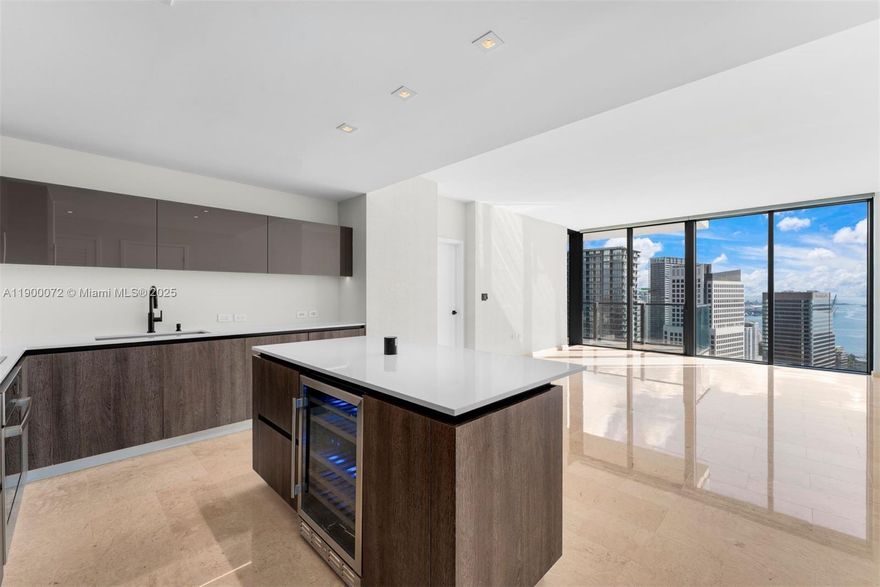 Immaculate & Elevated. The largest one-bedroom floor plan in Brickell City Centre, perched on a high floor with expansive east-facing city and water views. Comes with an assigned parking space alongside a rare developer-installed EV Charger. Finished to perfection with over $40,000 in upgrades — move in worry-free and enjoy elegant wallpaper throughout, Hunter Douglas window treatments, Lutron smart system, designer light fixtures, a 3-year-old Bosch A/C, and more. Whether you’re seeking a sophisticated Brickell retreat or a high-performing investment, this residence checks every box. Residents enjoy world-class amenities — all seamlessly connected to Brickell City Centre, Miami’s premier destination for shopping, dining, and entertainment.