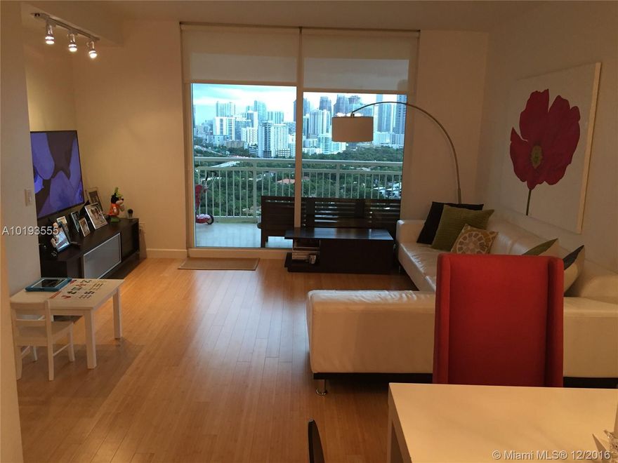 Amazing opportunity to rent this beautiful unit in the quiet part of Brickell. Upgraded residence with perfect view of Brickell/downtown skyline from every window. The spacious split plan provides privacy between bedrooms & features Bamboo wood floors, open kitchen w/new SS appliances, & marble master bath. Building features 24 Hr Sec, tennis court, pool, BBQ, sauna, hot tub, gym, media room, business ctr & playground. Comes w/2 parking spaces next to elevators+ storage. 24 Hr amenities access.