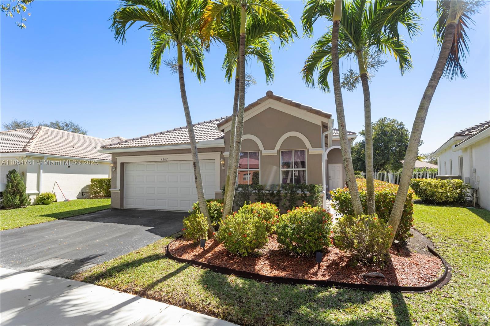 This beautiful 4 bed residence at The Ridges, Weston, boasts an oversized lot, providing ample space and privacy. Enjoy breathtaking lakefront views from your backyard oasis, complete with a sparkling pool. The modern kitchen
connects to the dining room, perfect for entertaining guests. Nestled in an amazing gated community, relish
exclusive access to a clubhouse with a pool, soccer, pickleball, basketball and beach volleyball courts, walking trails
and manicured landscaping. A-rated schools district, amazing lifestyle,comfort, and convenience. For showings please see broker remarks.