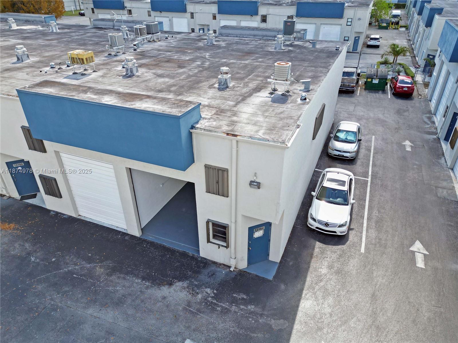 "Amazing location" is the only way to describe this quiet corner office/warehouse unit located in the highly desired Kendall Crossings Commerce Center. This secure warehouse is available for rent immediately and has a high 15' roll up door and a quaint private office which is airconditioned and has a bathroom. The water is included in the monthly rent and the unit comes with two parking spaces.