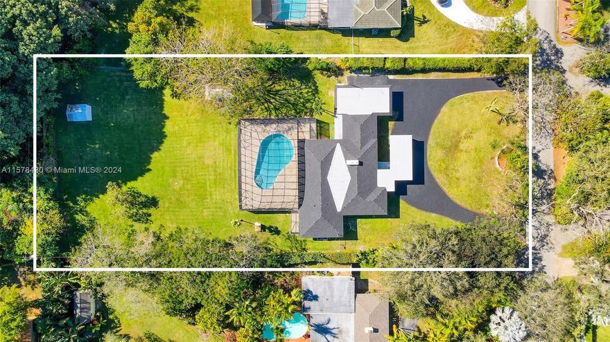 Discover your oasis in Pinecrest! This beautiful 4 BD 3 BA ranch-style home sits on a sprawling 1-acre lot in a  top-tier school district. Enjoy the seamless flow of the open concept layout, adorned with new windows & roof, a very spacious master suite with a walk-in closets. The eat-in kitchen has quartz counters with waterfall & stainless steel appliances, creating a perfect blend of style & functionality. Step outside to the enormous screened-in pool, perfect for entertaining. With this property, the possibilities are endless. The lot offers so much space that you can build your own soccer field in the back or hold and build your dream home later. Neighboring new constructions are selling from $5-8 million +, emphasizing the exceptional value of this property. Schedule your tour today!