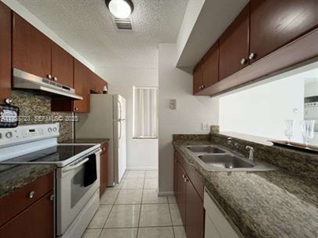 Photo of 11584 NW 44th St #11584, Coral Springs, FL 33065 (MLS # A11928723)