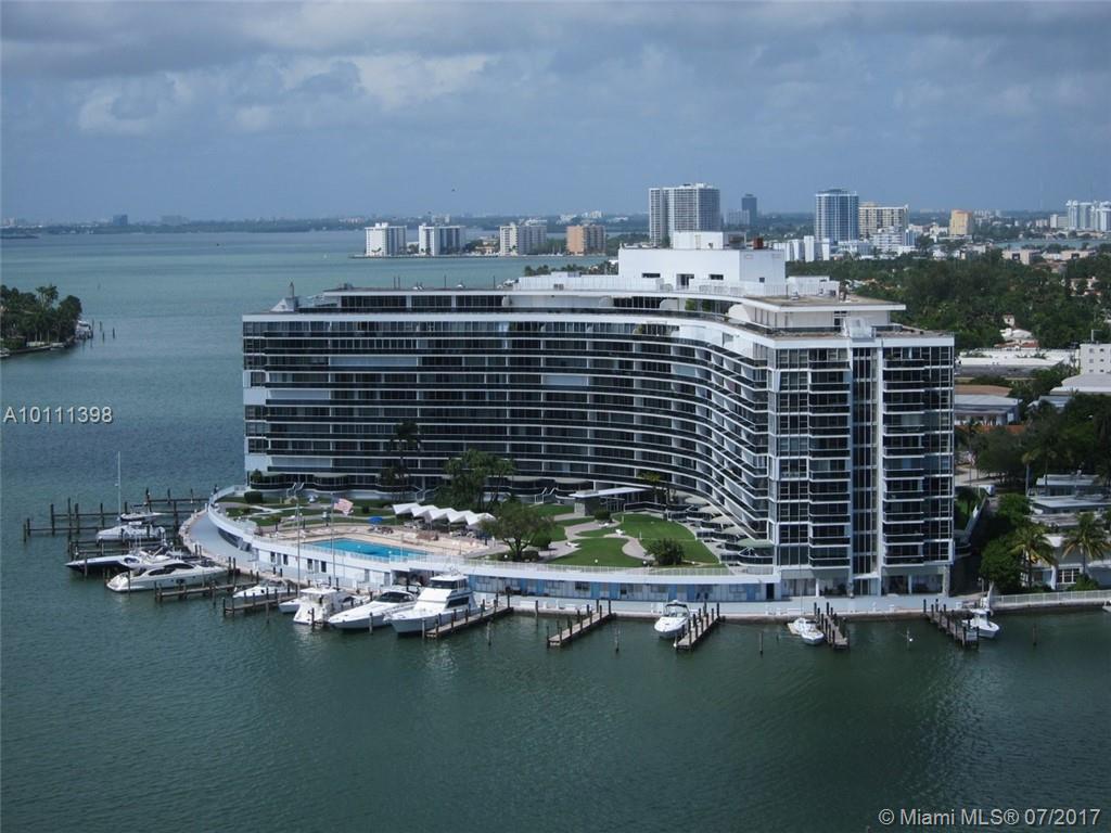 Magnificent Top floor with panoramic ocean, beach, intracostal & bay views in the prestigious King Cole building ! Floor to ceiling glass walls. Historic MIMO architecture. New hallways, balconies & docks. Luxury service, doorman & valet 24/7, olympic size heated pool, gym and marina. In order to buy a dock slip, you need to own a unit in the builidg. Residents can rent a dock slip from any dock slip unit owner. Maintenance includes all electric, water, HS Internet & cable TV. Waking distance to beach, restaurants, supermarkets, and shops. It will not last !!! EZ to show !! Big office or den that can be use as a guess room. Price just reduced, this is a very great price. Hurry, it will not last.