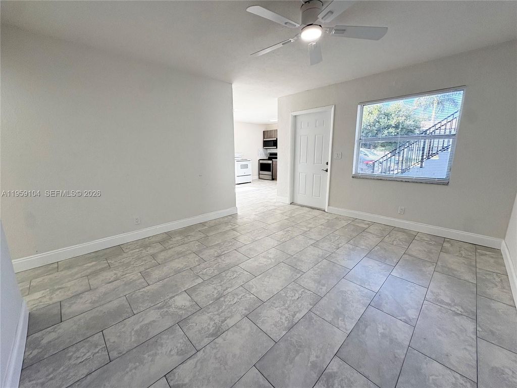 Photo of 4119 Woodside Dr #1, Coral Springs, FL 33065 (MLS # A11959104)