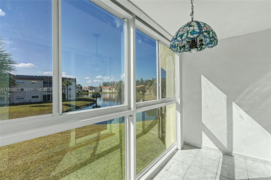 Updated waterfront 2/2 on the 2nd floor of Building 12, just steps from the Satellite 15 pool.  Impact windows throughout, including the enclosed balcony as well as the sliding glass doors to the balcony. New stainless steel appliances in the kitchen, updated bathrooms and walk-in closets. Gorgeous lake views from the balcony as well as the primary bedroom. Unit has just been professionally painted. Extra storage and laundry area located on the same floor. Home is ready for your personal touches. Amenities include pool, fitness center, clubhouse, theater, transportation, cable. COA says 55+, no leasing and no pets. 50 year re-certifications have been completed. Some trucks are OK, please call agent.