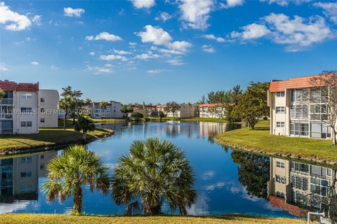 Photo of 2831 Sunrise Lakes Dr. E #204, Sunrise, FL 33322 (MLS # A11938015)
