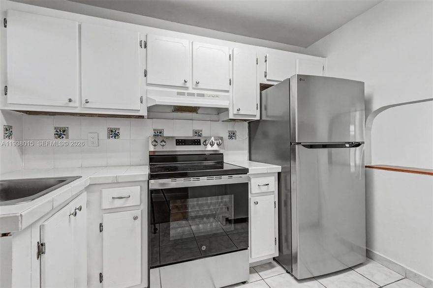 Updated waterfront 2/2 on the 2nd floor of Building 12, just steps from the Satellite 15 pool.  Impact windows throughout, including the enclosed balcony as well as the sliding glass doors to the balcony. New stainless steel appliances in the kitchen, updated bathrooms and walk-in closets. Gorgeous lake views from the balcony as well as the primary bedroom. Unit has just been professionally painted. Extra storage and laundry area located on the same floor. Home is ready for your personal touches. Amenities include pool, fitness center, clubhouse, theater, transportation, cable. COA says 55+, no leasing and no pets. 50 year re-certifications have been completed. Some trucks are OK, contact agent to confirm.