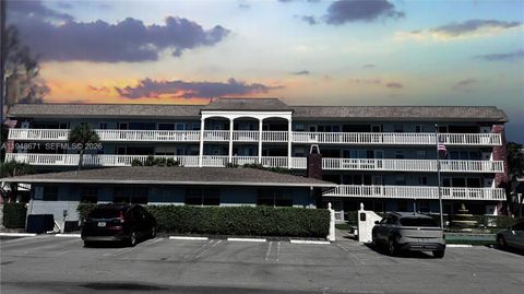 Photo of 1965 SE 5th Ct #203, Pompano Beach, FL 33060 (MLS # A11948671)