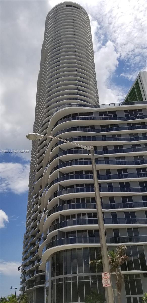 6 MTHS PREFERRED for this Beautiful 2/2.5 corner unit. New Appliances. Washer and Dryer in Unit. Vaulted ceiling with beautiful lighting. Motorized window treatment throughout unit. 90 degree terrace with beautiful city views and partial water views.. This residence features an inviting open layout, with well-appointed bedrooms that boast en-suite bathrooms and spacious custom walk-in closets. The floor-to-ceiling windows instantly greet you with a grand and breathtaking panoramic view. The spacious open-concept living area is flooded with natural light... Aria on the Bay is the building to be in... Enjoy all the amenities it offers. Hurry this unit will not last!! NO PETS AVAILABLE FOR 6 MONTHS PREFERRED!!