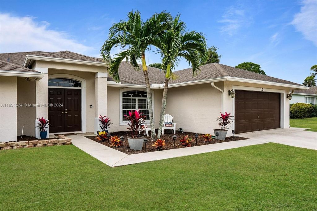 Photo of 121 Sherwood Dr, Royal Palm Beach, FL 33411 (MLS # A11531324)